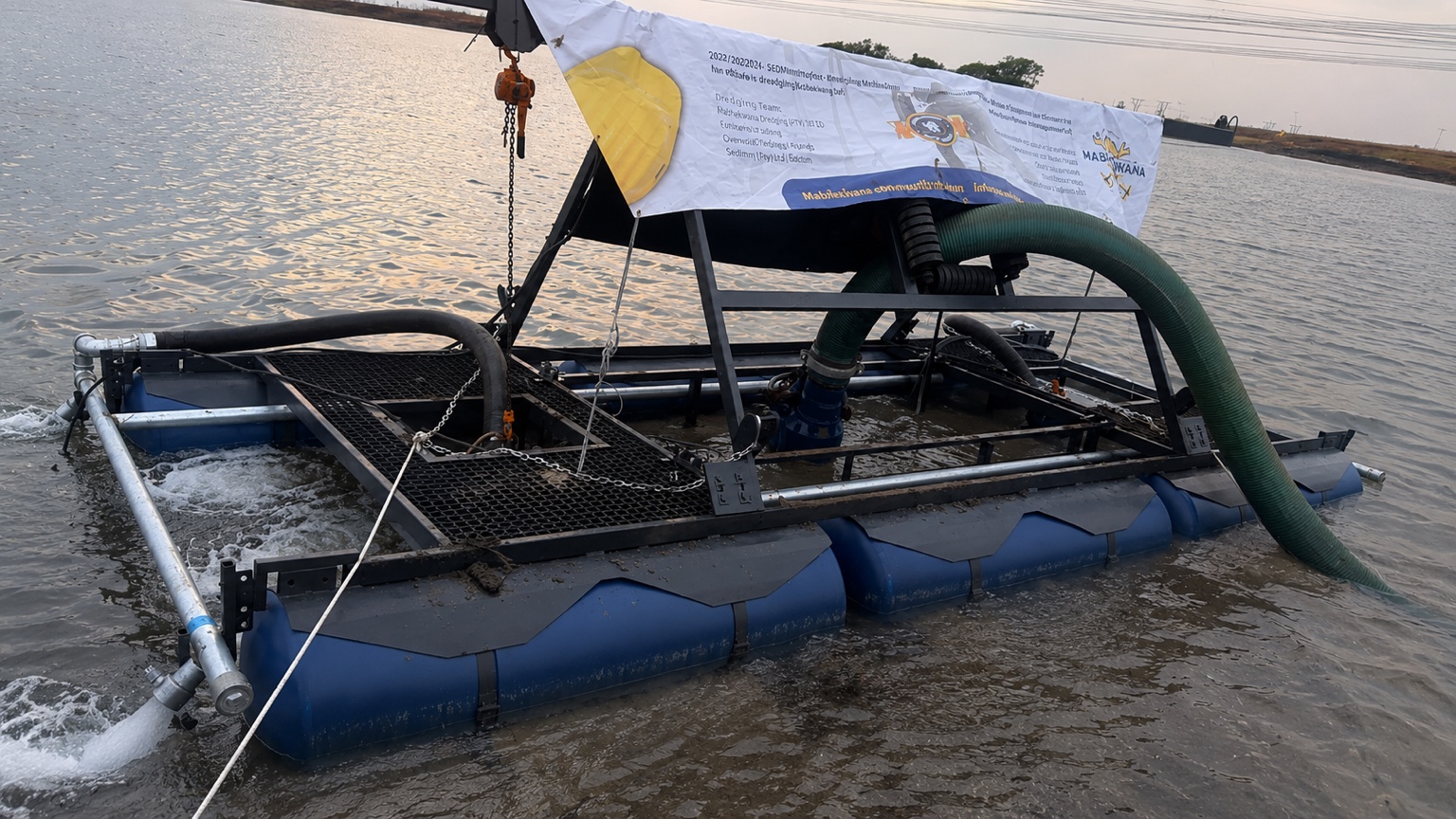 Mabhekwana floating dredging system operating on a dam